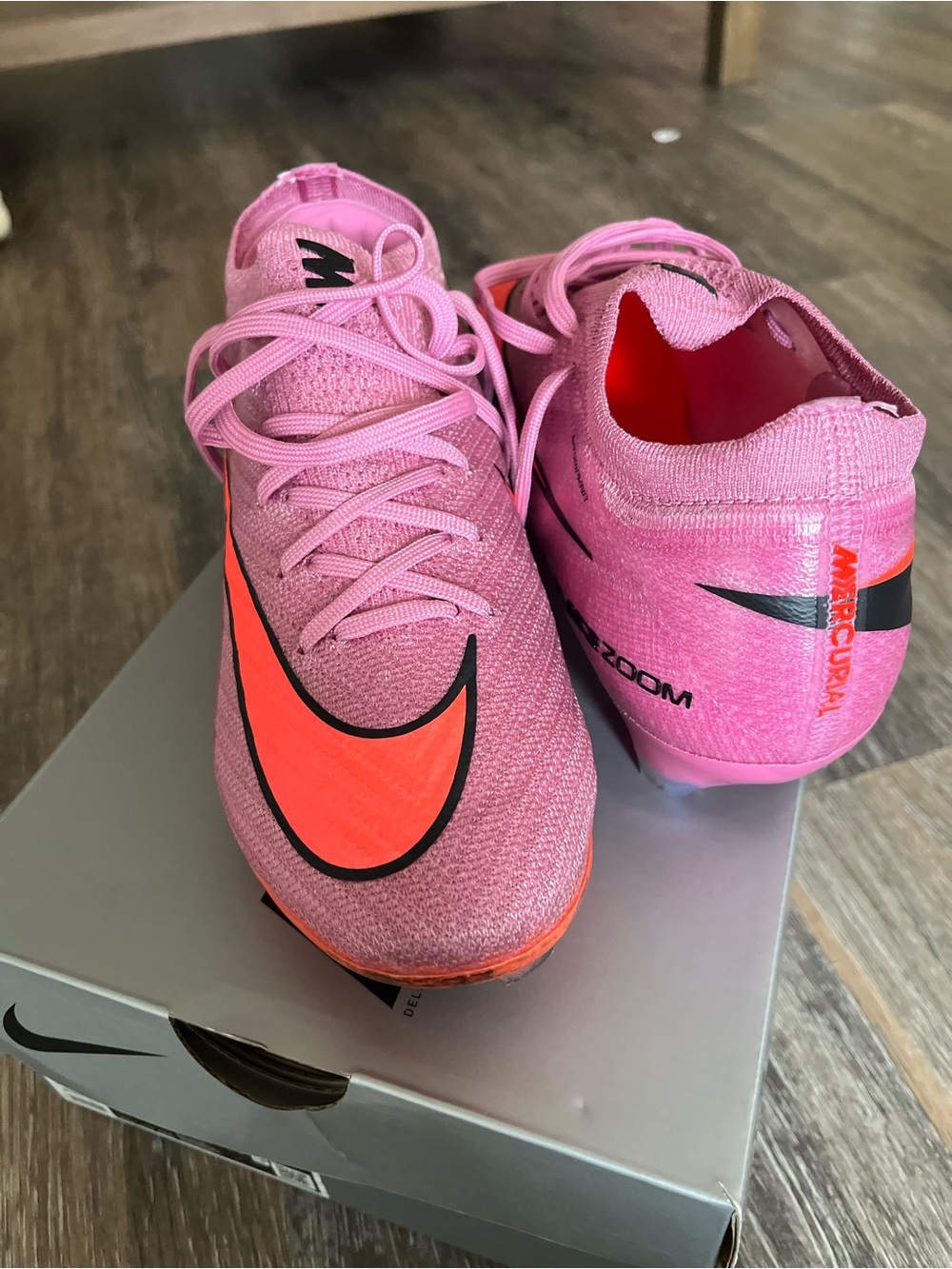 Nike Pink and Orange Men's Mercurial Athletic Cleats with matching bag
